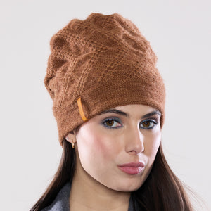 Women's winter Aries Ribbon Hat shown in the colour honey.