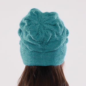 Women's winter Chevron Shield Hat shown in the colour aquamarine.