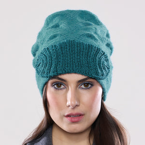 Women's winter Chevron Shield Hat shown in the colour aquamarine.