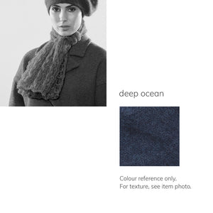 Women's winter Web Topper Scarf shown in the colour deep ocean.