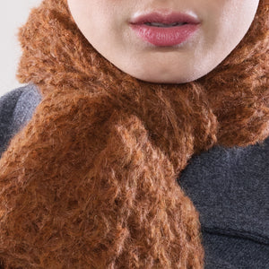 Women's winter Web Topper Scarf shown in the colour fire.
