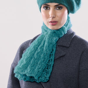 Women's winter Web Topper Scarf shown in the colour viridian.