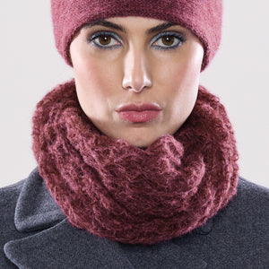 Women's winter Web Loop Scarf shown in the colour raspberry.