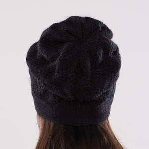 Women's winter Mercury Button Hat shown in the colour onyx.
