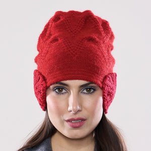 Women's winter Orion Earmuff Hat shown in the colour cardinal.