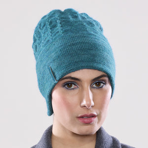 Women's winter Solstice Hat shown in the colour teal.