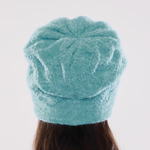 Women's winter Doppelzägger Button Hat shown in the colour robin's egg.