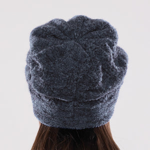 Women's winter Doppelzägger Ribbon Hat shown in the colour deep teal.