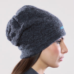 Women's winter Doppelzägger Ribbon Hat shown in the colour deep teal.